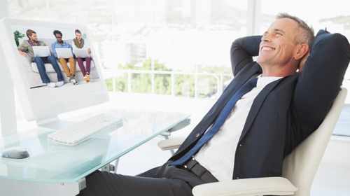 Relaxing businessman at work